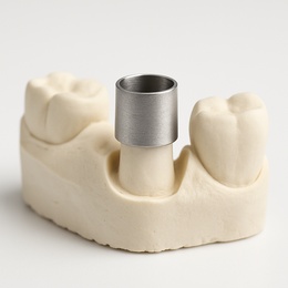 Reduction coping metal