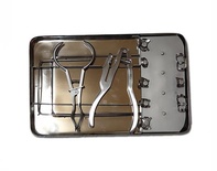 Insulation Kit with Clamps, Arch, and Punch for Dental Use