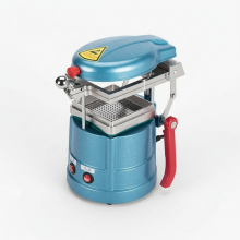 Vacuum thermoforming machine